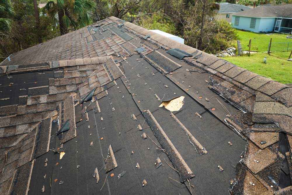 Storm-damaged roof Mansfield TX